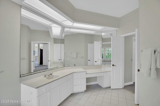 bathroom featuring vanity and tile patterned flooring