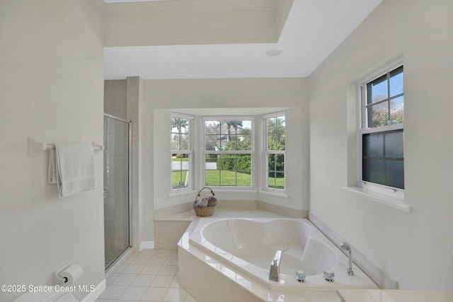 bathroom with plus walk in shower and tile patterned flooring