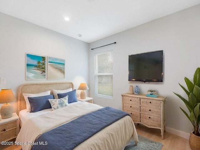 bedroom featuring wood-type flooring