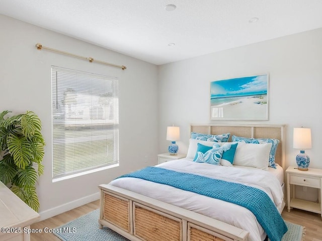 bedroom featuring light hardwood / wood-style flooring