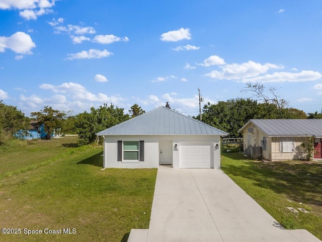 ranch-style home with a garage and a front yard