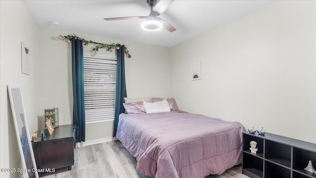 bedroom featuring ceiling fan and light hardwood / wood-style floors