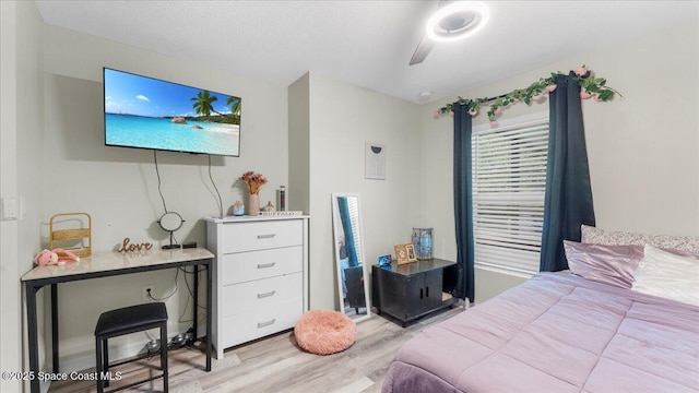 bedroom with light hardwood / wood-style flooring