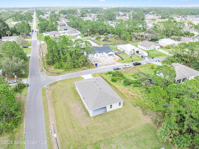 drone / aerial view with a residential view