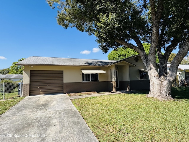 ranch-style home with a garage, concrete driveway, brick siding, and a front yard