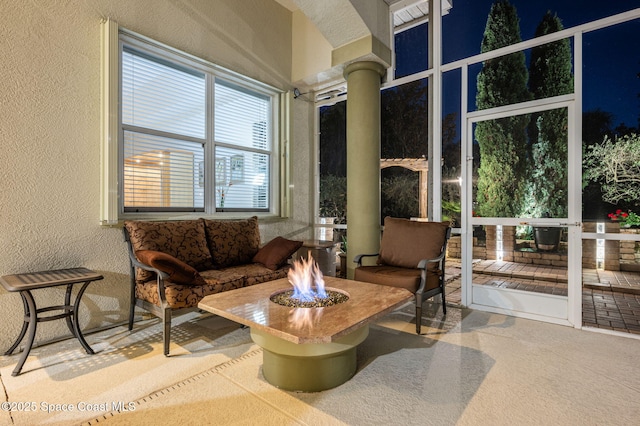 sunroom / solarium with decorative columns