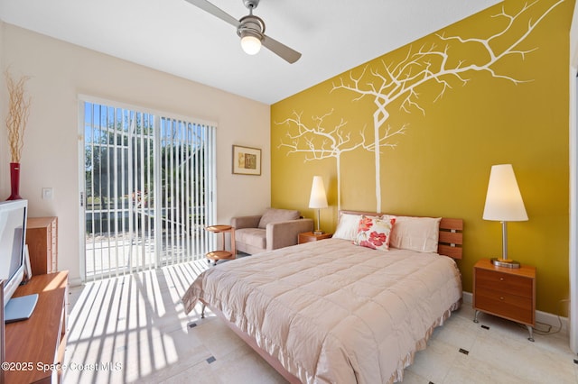 bedroom with access to outside, an accent wall, baseboards, and ceiling fan