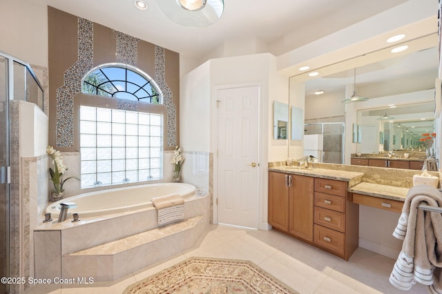 full bath with a garden tub, recessed lighting, vanity, a shower stall, and tile patterned floors