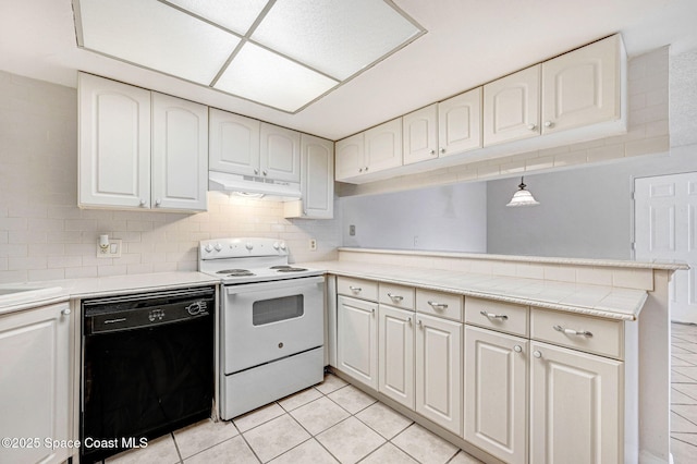 kitchen with white electric stove, black dishwasher, hanging light fixtures, light tile patterned floors, and kitchen peninsula