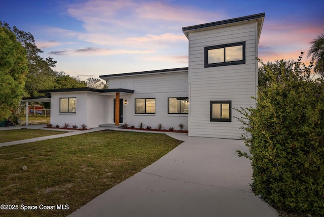 contemporary house featuring a yard