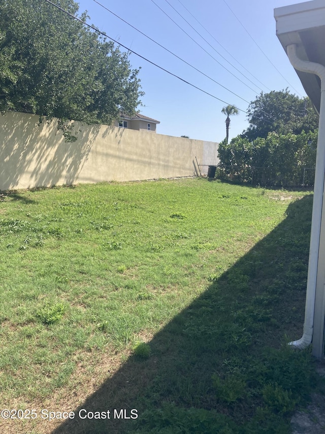 view of yard with fence