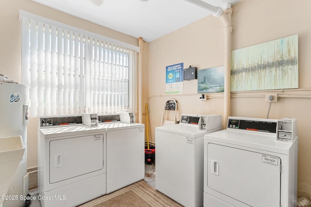 common laundry area with washer and dryer