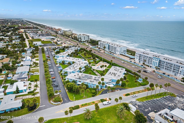 aerial view featuring a water view and a city view