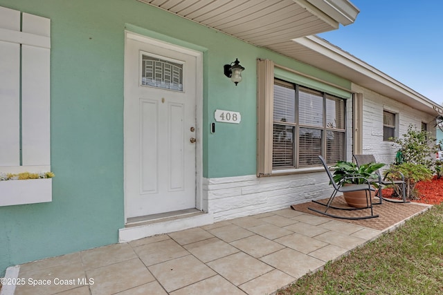 property entrance with a porch