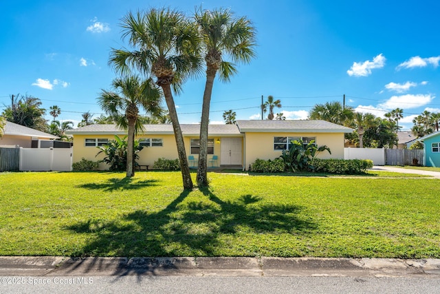 ranch-style house with a front yard