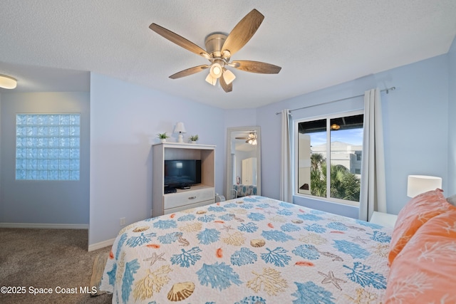 8600 Ridgewood Ave Unit 1308, Cape Canaveral, FL 32920 - carpeted bedroom with ceiling fan and a textured ceiling