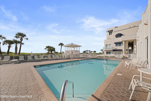8600 Ridgewood Ave Unit 1308, Cape Canaveral, FL 32920 - community pool with a patio