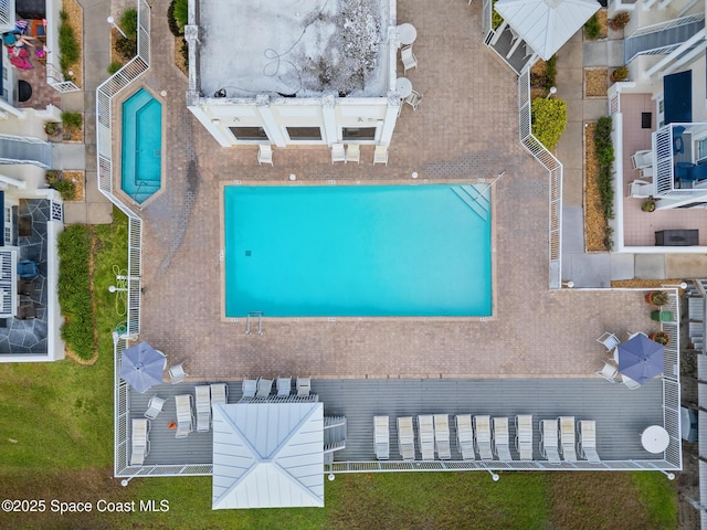 8600 Ridgewood Ave Unit 1308, Cape Canaveral, FL 32920 - drone / aerial view of a pool area