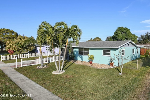 single story home featuring a front yard