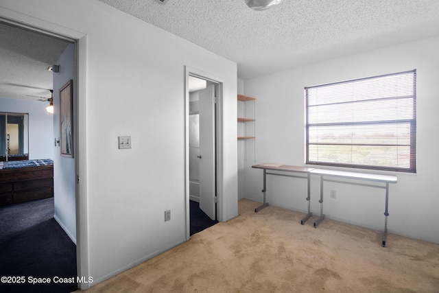 interior space with a textured ceiling