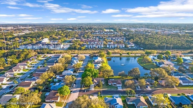 bird's eye view with a water view and a residential view
