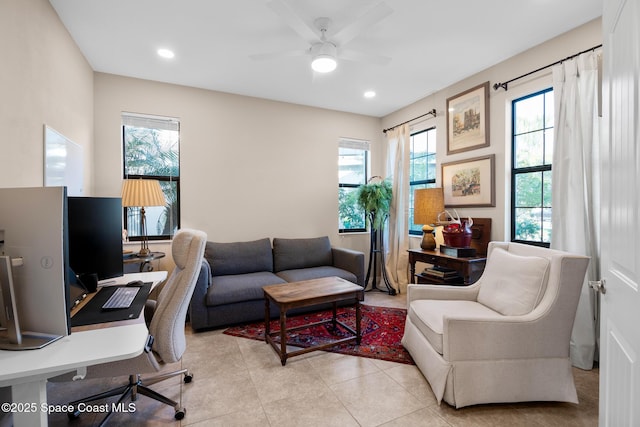 office featuring light tile patterned floors, plenty of natural light, ceiling fan, and recessed lighting