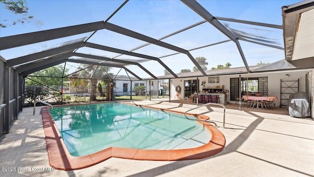 pool with glass enclosure, a bar, and a patio area