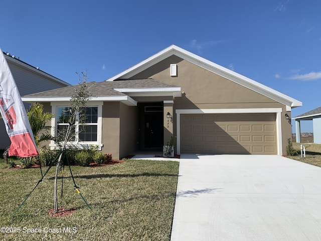 ranch-style home featuring a garage and a front yard