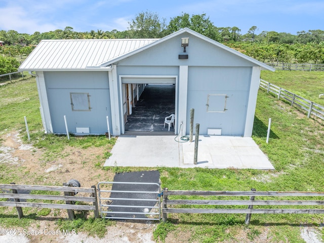 garage featuring fence