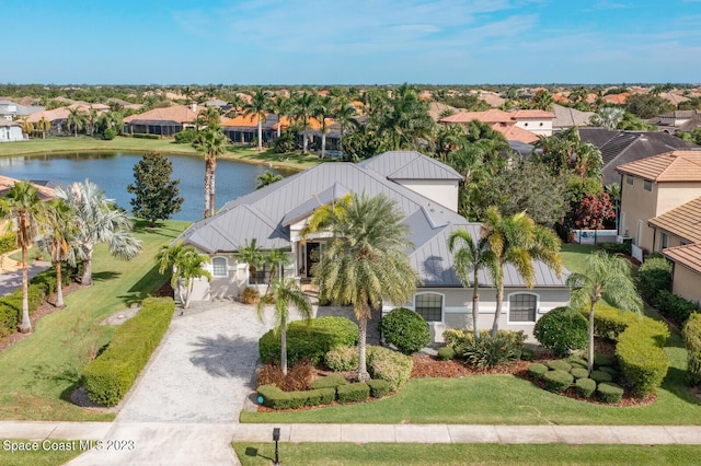 drone / aerial view with a water view