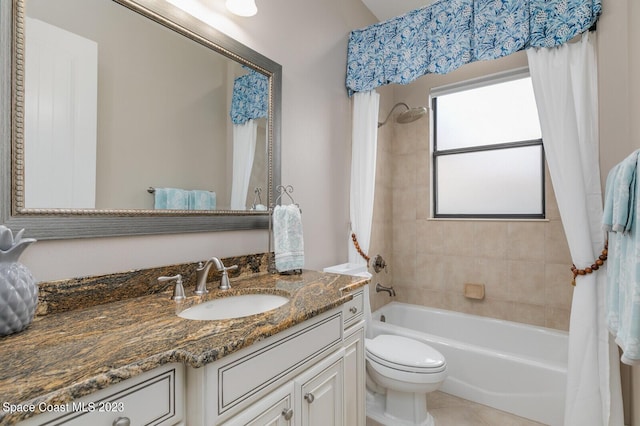 full bathroom with vanity, shower / tub combo, tile patterned floors, and toilet