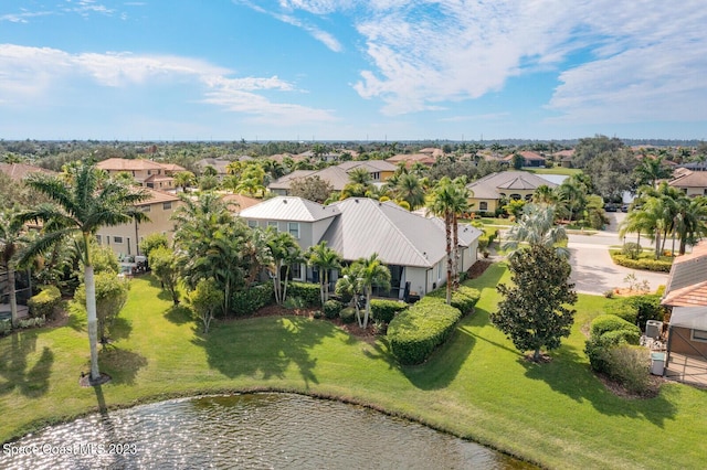 drone / aerial view with a water view