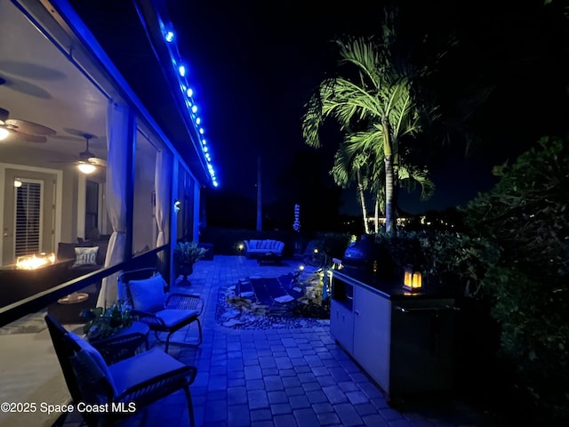 view of patio at twilight