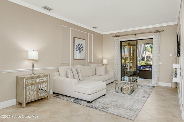 tiled living room featuring crown molding