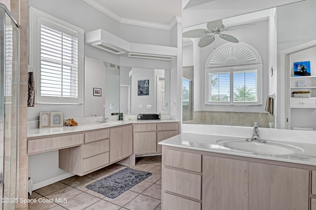 bathroom with ceiling fan, tile patterned flooring, vanity, a shower stall, and crown molding