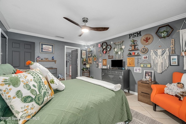 bedroom featuring light tile patterned floors, visible vents, ornamental molding, ceiling fan, and baseboards