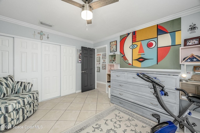 bedroom featuring visible vents, a closet, and ornamental molding