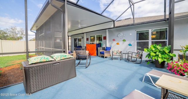 sunroom / solarium with ceiling fan