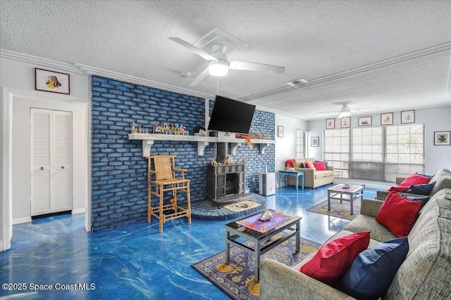 living room with ceiling fan and a textured ceiling