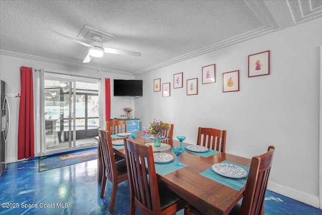 dining space featuring ceiling fan, crown molding, and a textured ceiling