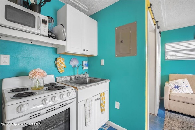 kitchen with white range with electric stovetop, white cabinetry, sink, electric panel, and a textured ceiling