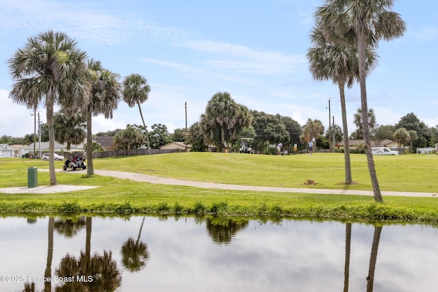 2145 Golf Isle Dr Unit 1212, Melbourne, FL 32935 - view of community with a water view and a lawn