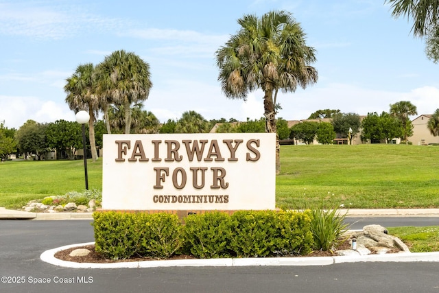 2145 Golf Isle Dr Unit 1212, Melbourne, FL 32935 - community sign featuring a lawn