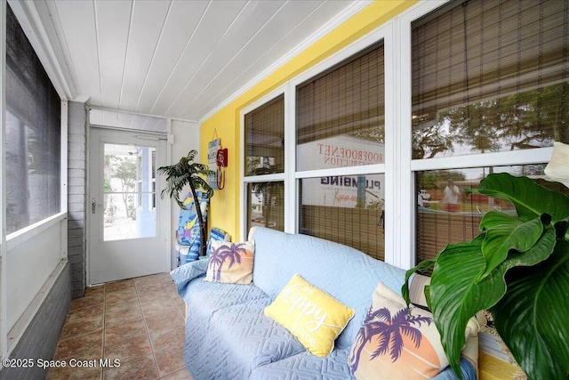 sunroom with wood ceiling