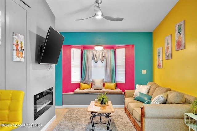 living room with ceiling fan