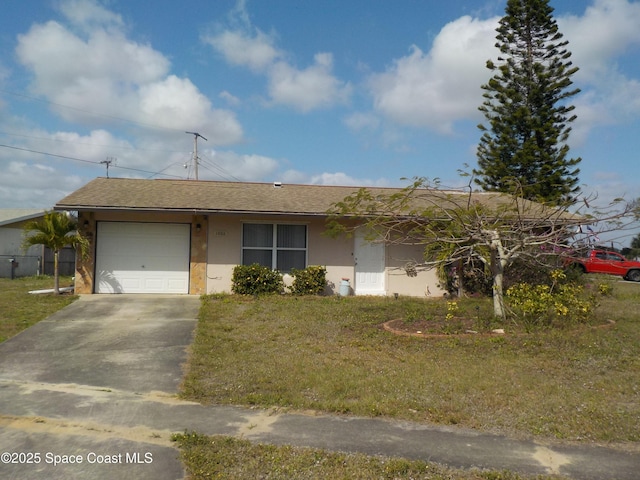 view of front of home with a garage and a front yard