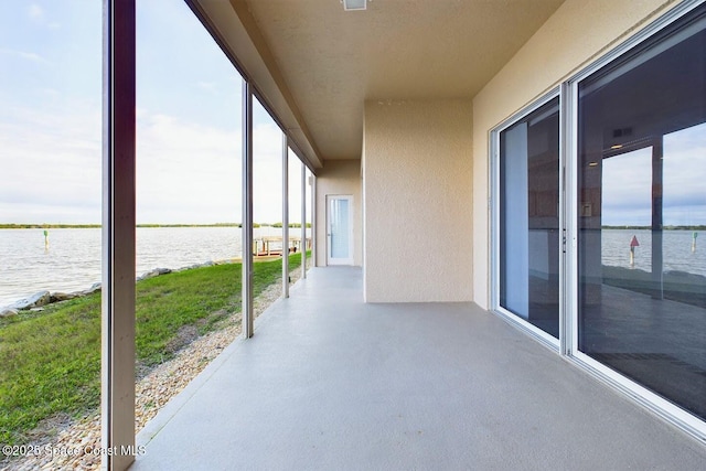 view of patio / terrace featuring a water view