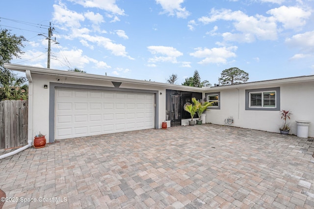 230 Andros Dr, Merritt Island, FL 32952 - view of front facade with a garage