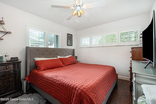 230 Andros Dr, Merritt Island, FL 32952 - bedroom with multiple windows, dark hardwood / wood-style floors, and ceiling fan