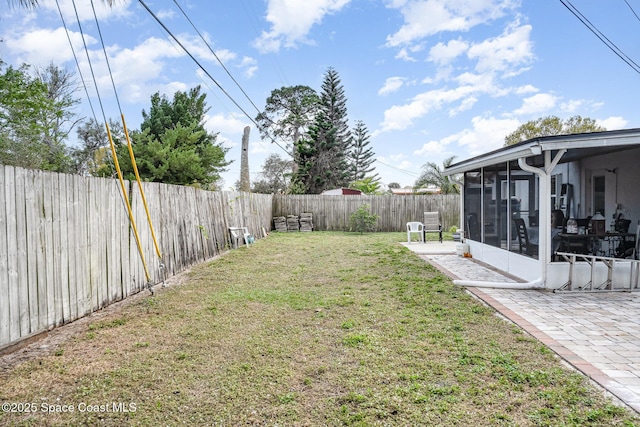 230 Andros Dr, Merritt Island, FL 32952 - view of yard featuring a patio and a sunroom